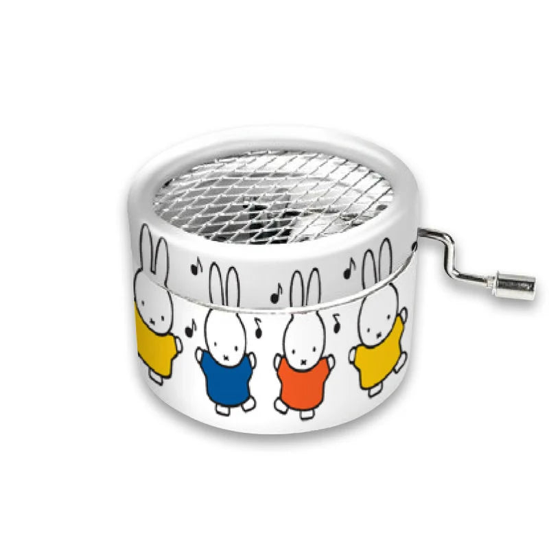Music box with colorful rabbit designs on a white background