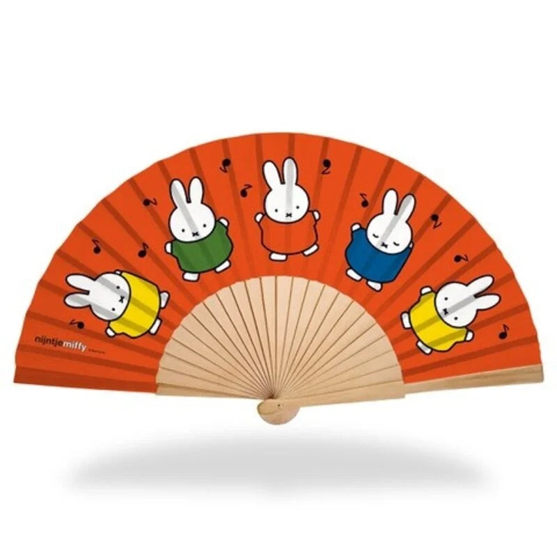 Hand fan with cartoon characters on a red background