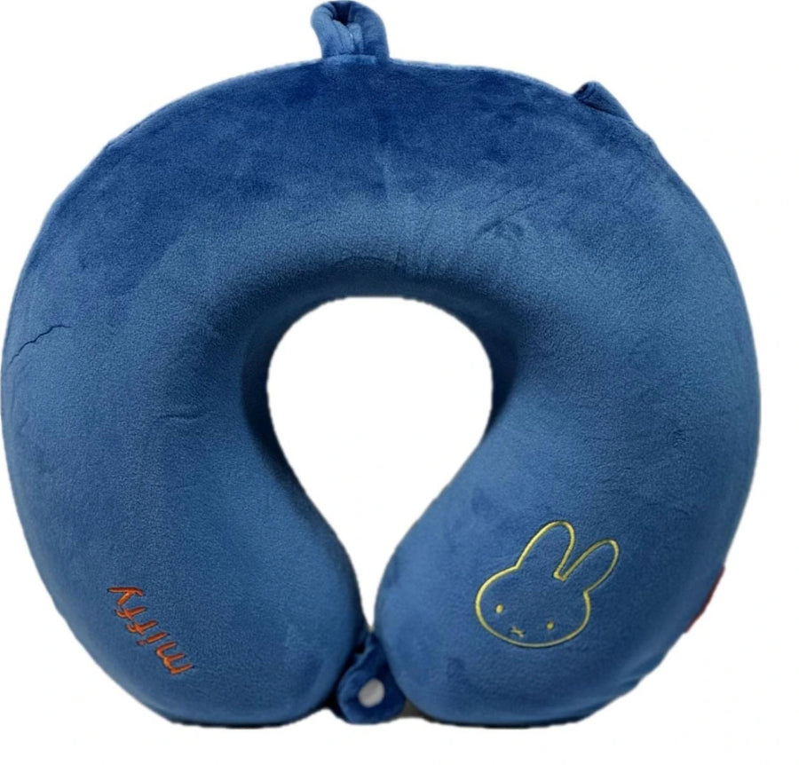 Blue neck pillow with a cartoon character on a white background