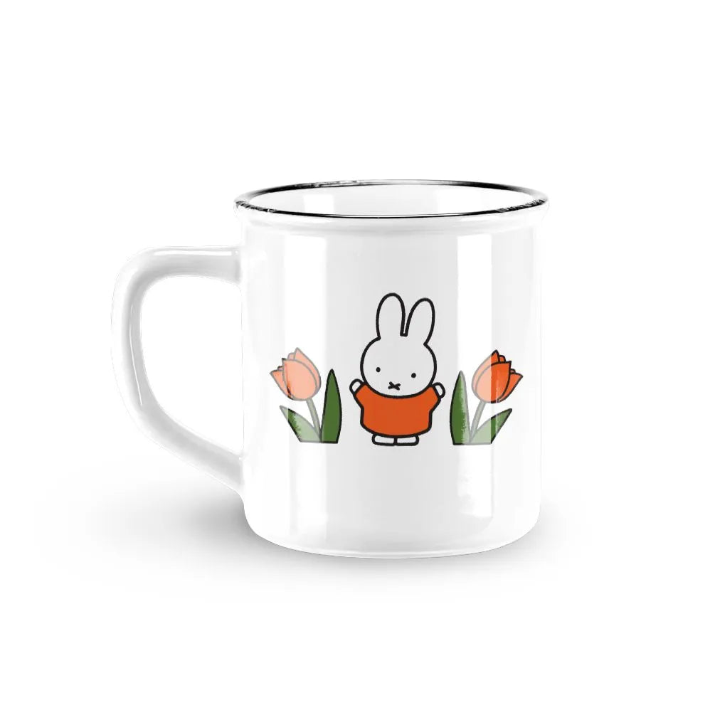 White mug with a cartoon bunny and tulips design on a white background