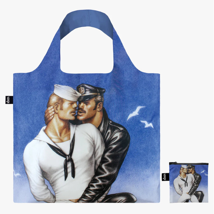 Foldable tote bag with a design of two sailors embracing against a blue sky.