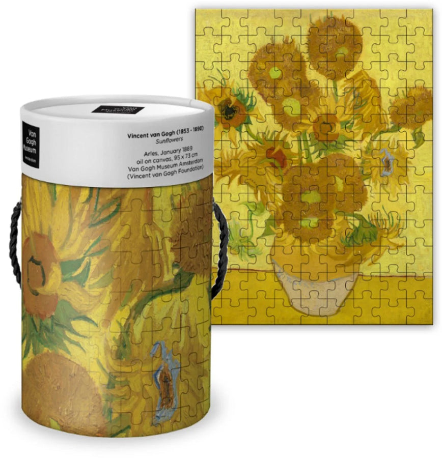 Puzzle with sunflower design and cylindrical packaging on a white background