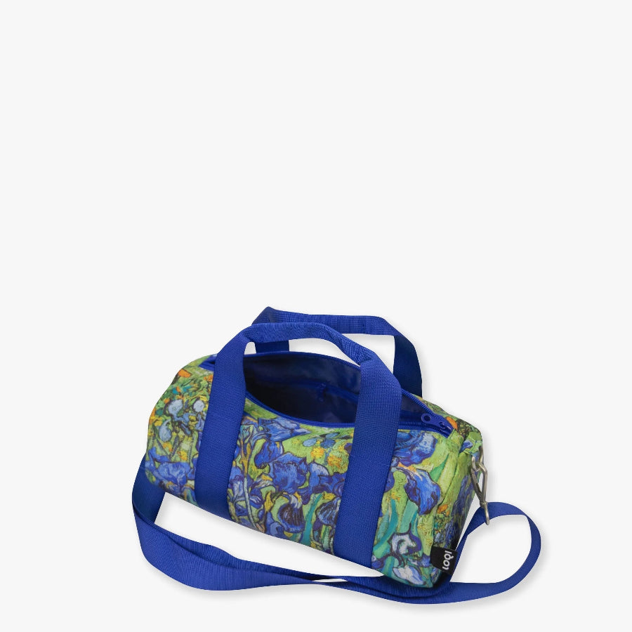 Duffle bag with blue handles and strap on a white background