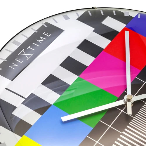 Colorful geometric-patterned clock with 'Nextime' branding on a white background