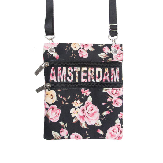Black Amsterdam passport bag with pink floral rose print and adjustable strap