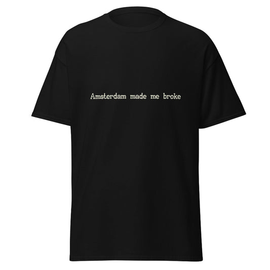 Funny Amsterdam T-shirt featuring the phrase "Amsterdam Made Me Broke". A playful design for travellers, city lovers, and souvenir hunters.