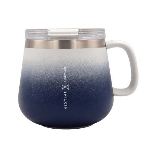A Next Level Less More insulated tumbler with a handle, featuring a white-to-dark-blue gradient body, a stainless steel rim, and a clear lid, shown on a white background.