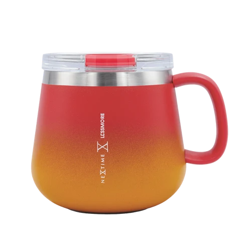 A Lessmore Next Time insulated travel mug with a red and orange gradient design, a clear lid, and a red handle, shown on a white background.