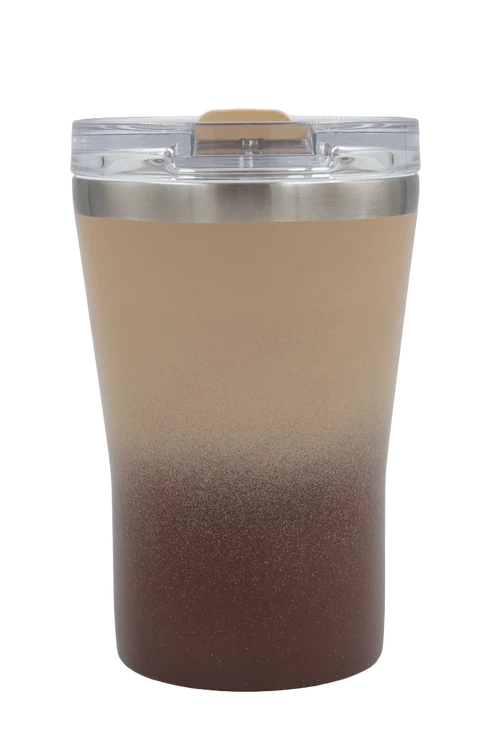 A travel tumbler with a clear lid and a gradient design that fades from a light beige at the top to a dark brown at the bottom, with a metallic silver rim.