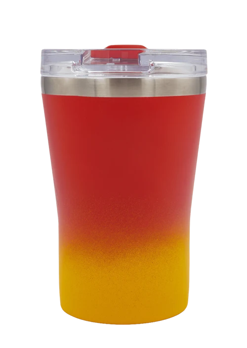A tall insulated travel tumbler with a red-to-yellow gradient body, a stainless steel rim, and a clear lid with a red top, shown on a plain white background.