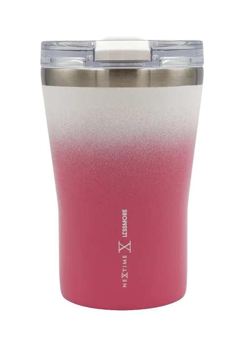 A 20oz insulated travel tumbler with a lid, featuring a white-to-pink gradient design. The upper half is white with a subtle speckled texture, and the lower half is a solid dusty pink.