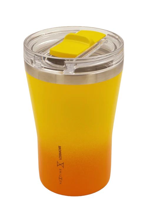 A stainless steel travel tumbler with a yellow-to-orange gradient finish, featuring a clear lid with a yellow flip-top straw cover, shown on a white background.