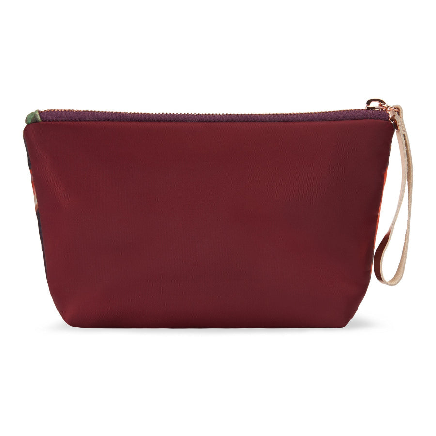 A burgundy nylon pouch with a top zipper, a light beige wristlet strap, and a small green accent on the left side, shown against a plain white background.