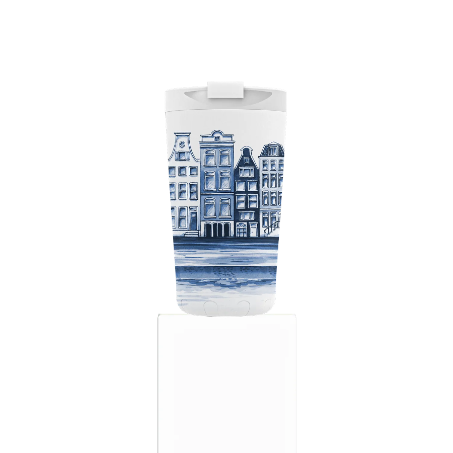 Tumbler with blue and white architectural design on a white background