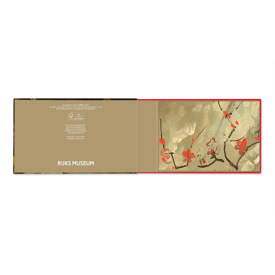 An open art book or portfolio from the Ruis Museum, featuring a textured beige cover on the left and a floral print with red blossoms on a textured beige and gold background on the right.