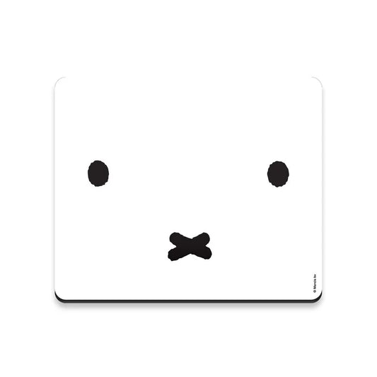 White mouse pad with black smiley face design on a white background