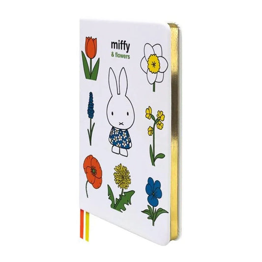 Notebook with illustrations of a rabbit and flowers on a white background