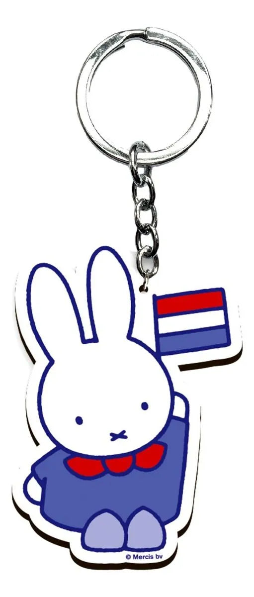 Keychain with a cartoon rabbit character holding a Dutch flag on a white background