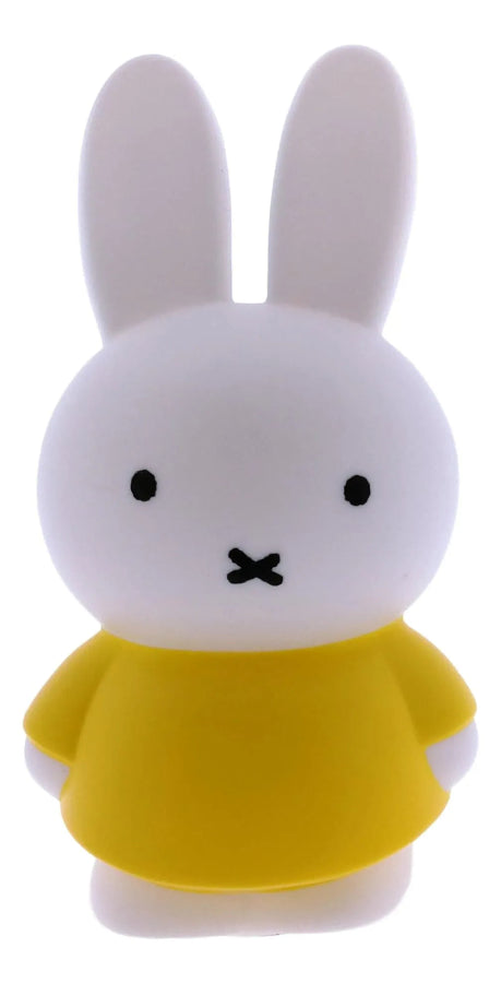 White rabbit character with a yellow shirt on a white background