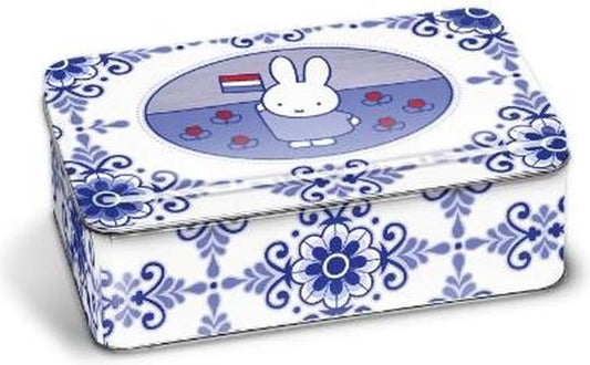 Decorative tin box with blue floral patterns and a cartoon character on a white background