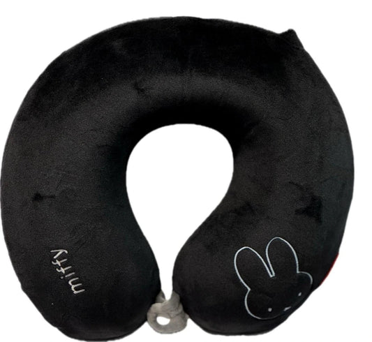 Black travel neck pillow with a cartoon design on a white background