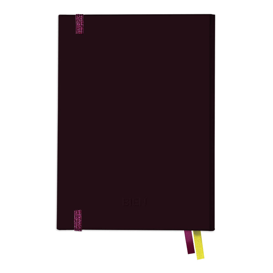A dark plum-colored hardcover notebook with a matching elastic closure and two ribbon bookmarks (one purple, one yellow) peeking out from the bottom right corner. The brand name 'Eiken' is subtly embossed near the bottom center.