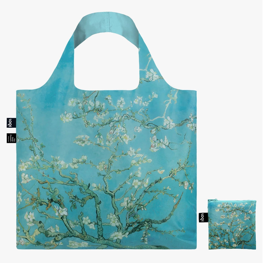 Reusable shopping bag with floral design on a blue background