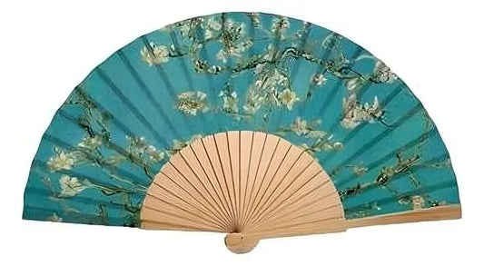 Handheld fan with floral design on a blue background