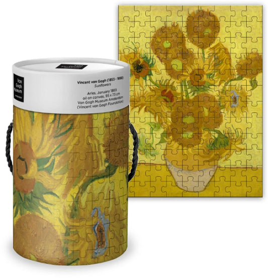 Puzzle with sunflower design and cylindrical packaging on a white background