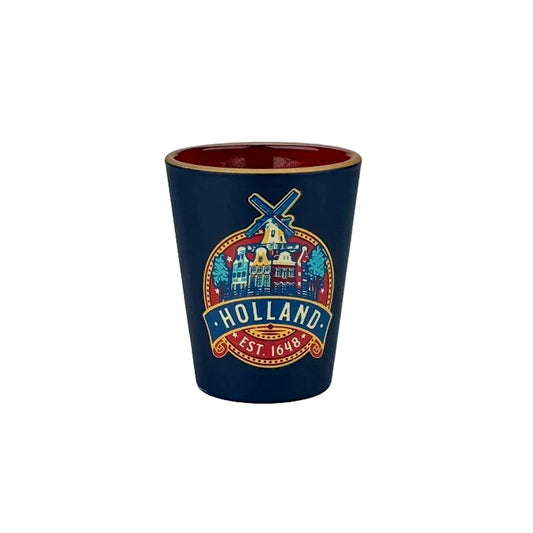 Blue vintage shot glass with Holland round label windmills and canal houses