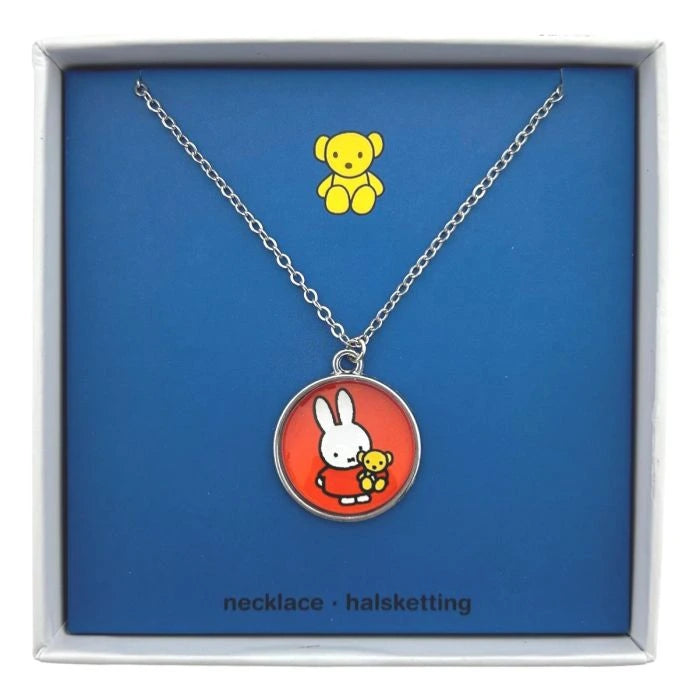 Necklace with a round pendant featuring a cartoon character on a blue background