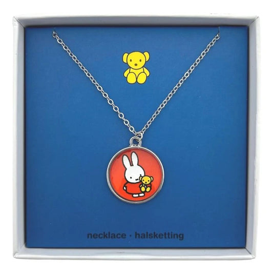 Necklace with a round pendant featuring a cartoon character on a blue background