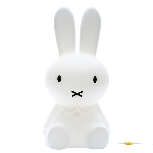 White rabbit-shaped night light on a white background